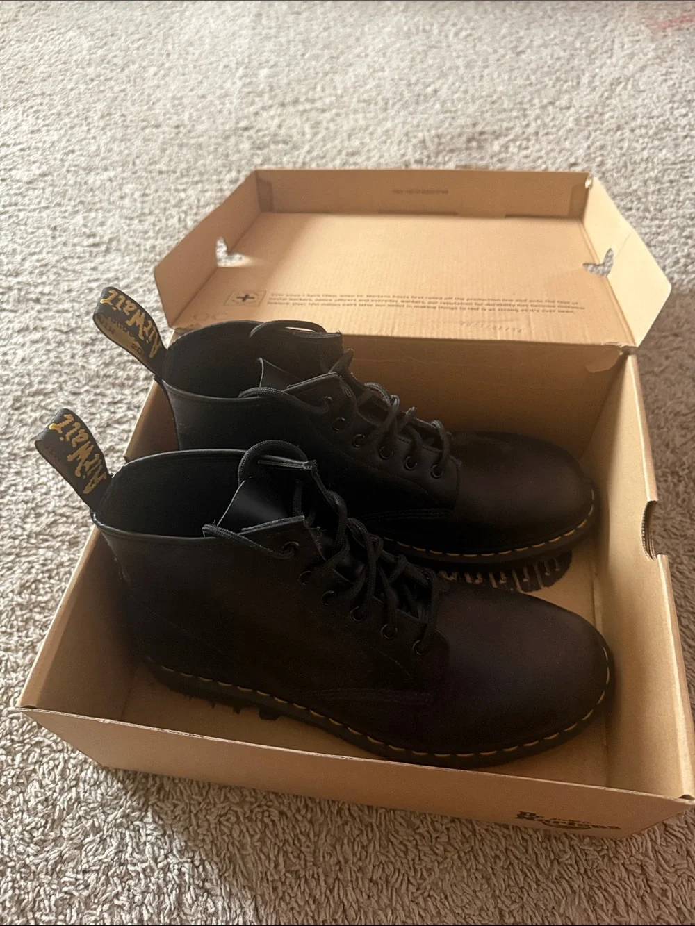 Dr. Martens Black Leather 8-Eye Lace-Up Boots with Yellow Stitching